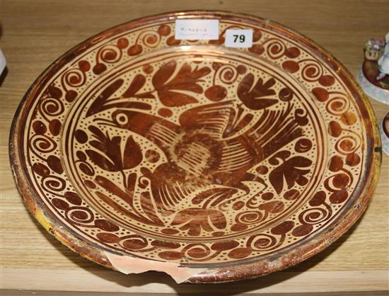 An 18th century Manises copper lustre bowl, af, 35cm
